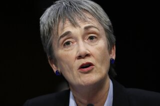 FILE - In this Dec. 6, 2017, file photo, Air Force Secretary Heather Wilson is testifies during a Senate Judiciary Committee hearing on Capitol Hill in Washington. Officials say Wilson has resigned. (AP Photo/Carolyn Kaster, File)