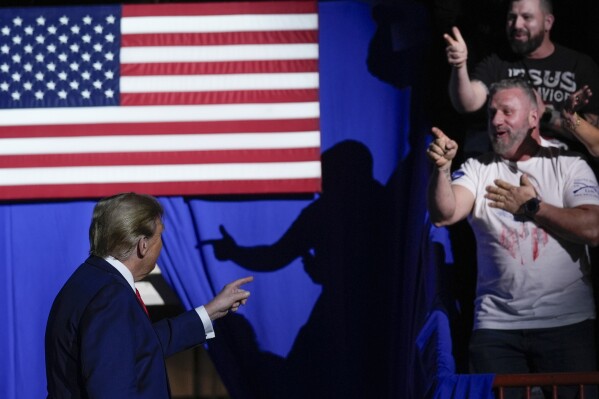 Republican presidential candidate former President Donald Trump arrives to speak at the National Rifle Association's Presidential Forum in Harrisburg, Pa., Friday, Feb. 9, 2024. (AP Photo/Matt Rourke)