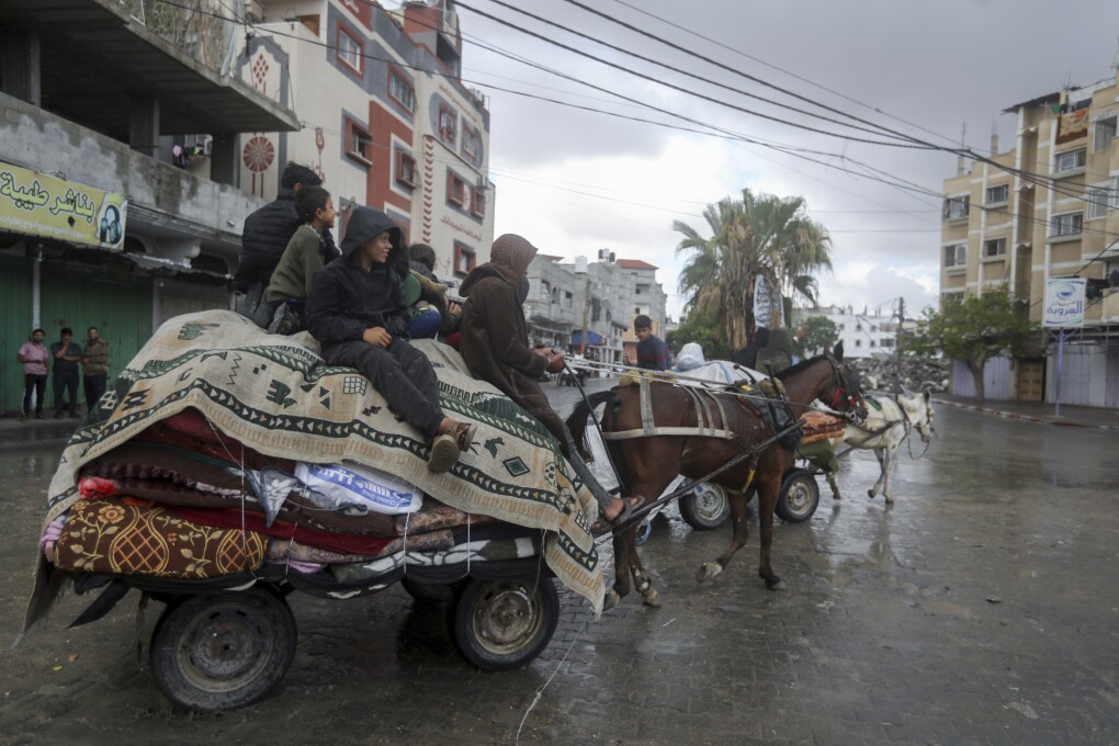 Palestinians flee from the eastern side of the southern Gaza city of Rafah after the Israeli army orders them to evacuate ahead of a military operation, in Rafah, Gaza Strip, Monday, May 6, 2024. The order affects tens of thousands of people and could signal a broader invasion of Rafah, which Israel has identified as Hamas' last major stronghold after seven months of war. (AP Photo/Ismael Abu Dayyah)