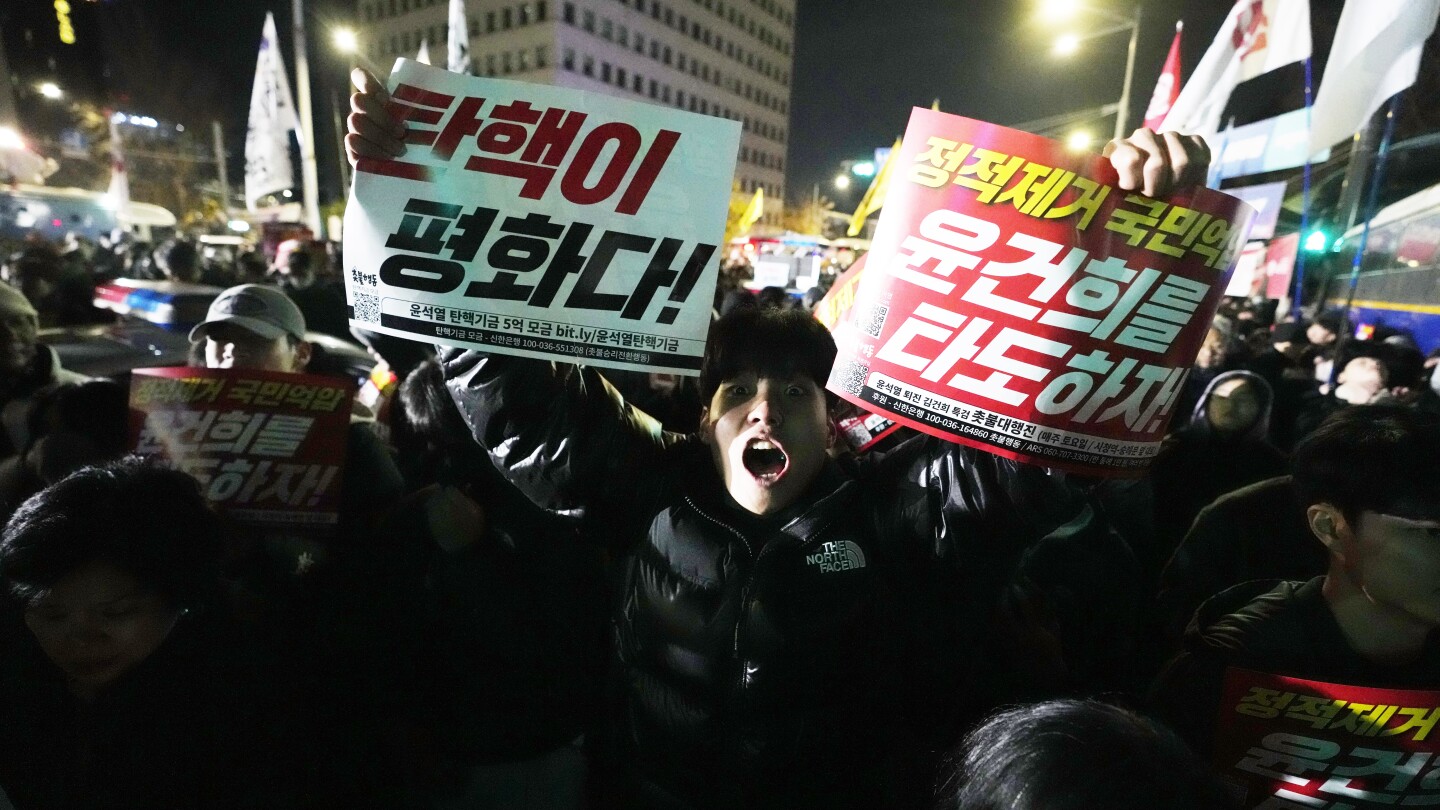 South Korean president says he will lift martial law