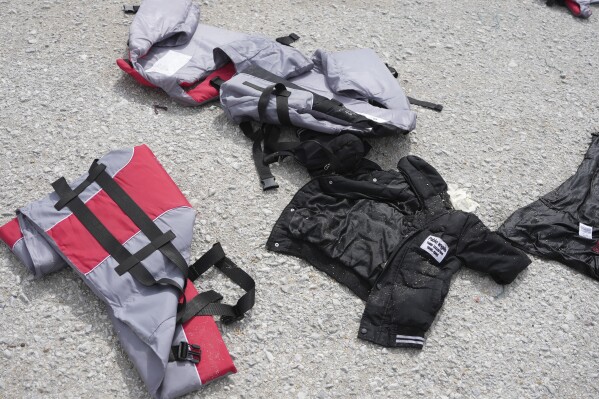 Lifejackets lie at Petra port, after the capsizing of a boat carrying migrants, off the coast on the northeastern Aegean Sea island of Lesbos, Greece, Thursday, April 3, 2025. (AP Photo/Panagiotis Balaskas)