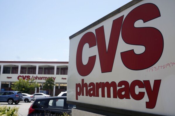 FILE - A sign marks a CVS branch on Tuesday, May 16, 2023, in Pasadena, Calif. CVS Health reports earnings on Wednesday, May 1, 2024 (AP Photo/Marcio Jose Sanchez, File)