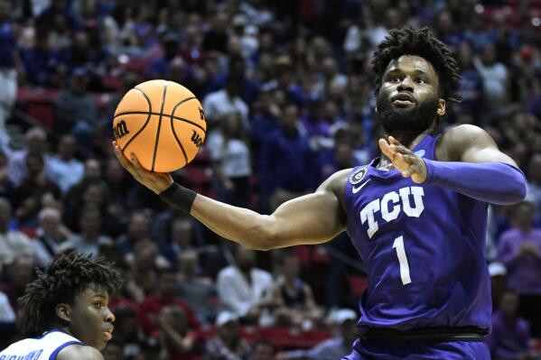 TCU guard Mike Miles Jr. drives to the hoop during the first half of a first-round NCAA college basketball tournament game against Seton Hall, Friday, March 18, 2022, in San Diego. (AP Photo/Denis Poroy)