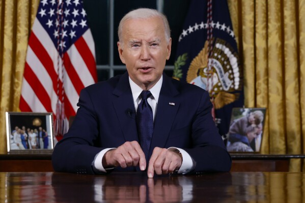 FILE - President Joe Biden speaks from the Oval Office of the White House Oct. 19, 2023, in Washington, about the war in Israel and Ukraine. Nearly half of Democrats disapprove of how Biden is handling the Israel-Hamas conflict, according to a new Associated Press-NORC Center for Public Affairs Research poll. The war could complicate Biden's reelection effort as he tries to balance factions of his party with very different views on the conflict. (Jonathan Ernst/Pool via AP, File)