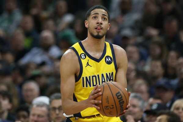 FILE - Indiana Pacers' Tyrese Haliburton plays against the Boston Celtics during the second half of an NBA basketball game, Friday, March 24, 2023, in Boston. The Indiana Pacers officially locked up their future Thursday, July 6, announcing they had agreed with All-Star guard Tyrese Haliburton on a five-year max contract that could pay a franchise record $260 million. (AP Photo/Michael Dwyer)