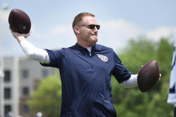 Tennessee Titans offensive coordinator Todd Downing throws to receivers during NFL football training camp Thursday, May 27, 2021, in Nashville, Tenn. (George Walker IV/The Tennessean via AP, Pool)