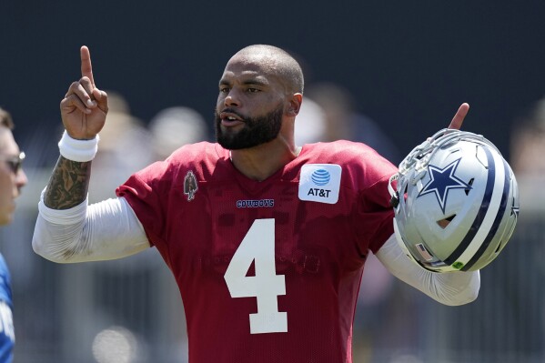 Dak Prescott hasn't solved the playoff puzzle for the Cowboys. The star QB  is ready to try again | AP News