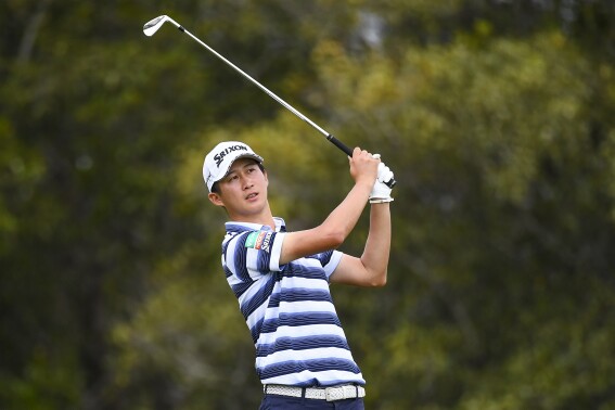 Japan's Rikuya Hoshino plays a shot during the third round of the Australian PGA Championship in Brisbane, Saturday, Nov. 25, 2023. (Jono Searle/AAP Image via AP)