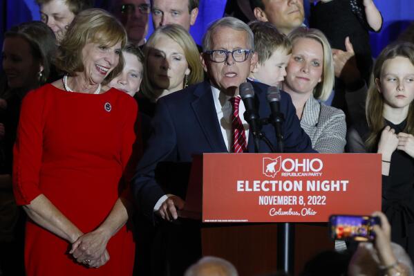 Republican Ohio Gov. Mike DeWine, right, speaks during an election night watch party as his wife, Fran, stands next to him Tuesday, Nov. 8, 2022, in Columbus, Ohio. (AP Photo/Jay LaPrete)