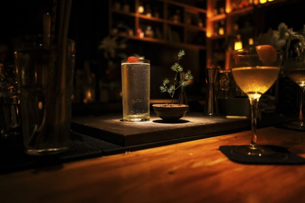 A speciality cocktail made with fish sauce is displayed at the Liquid Store, on Feb. 19, 2025, in Hanoi, Vietnam. (AP Photo/Yannick Peterhans)