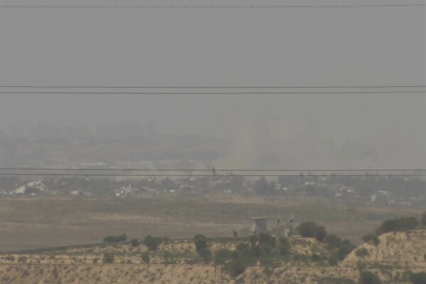 A screenshot taken from AP video showing a general view of northern Gaza as seen from Southern Israel, before it was seized by Israeli officials on Tuesday, May 21, 2024. Israeli officials seized a camera and broadcasting equipment belonging to The Associated Press in southern Israel on Tuesday, accusing the news organization of violating the country’s new ban on Al Jazeera. Shortly before the equipment was seized, it was broadcasting a general view of northern Gaza. (AP Photo)