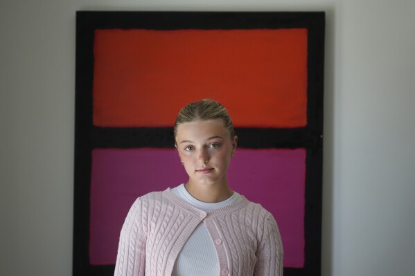 Sienna Keene, 17, poses for photos in Orinda, Calif., Monday, April 29, 2024. The Associated Press spoke with teenagers and young adults about their experiences on social media and what they wish they had known when they first got online. (AP Photo/Jeff Chiu)