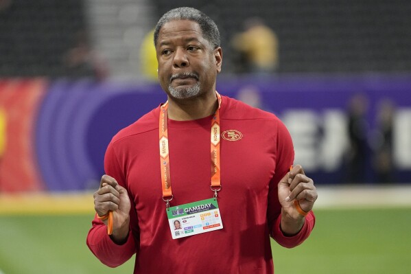 San Francisco 49ers defensive coordinator Steve Wilks walks on the field before the NFL Super Bowl 58 football game against the Kansas City Chiefs, Sunday, Feb. 11, 2024, in Las Vegas. (AP Photo/George Walker IV)