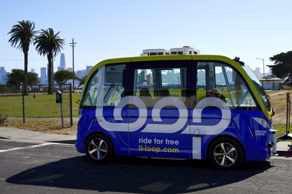 A driverless shuttle transports passengers on San Francisco's Treasure Island as part of a pilot program to assess the safety and effectiveness of autonomous vehicles for public transit on Aug. 16, 2023. The free bus service was launched less than a week after California regulators approved the controversial expansion of robotaxis on city streets. (AP Photo/Terry Chea)
