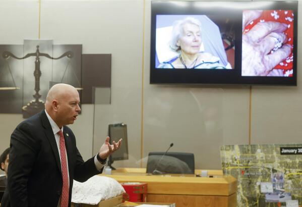 Prosecutor Glen Fitzmartin delivers his closing statement as picture of victim Mary Bartel displays on the screen during the final day of the third trial of Billy Chemirmir at Frank Crowley Courts Building in Dallas on Friday, Oct. 7, 2022. Chemirmir, 49, is charged with capital murder of 22 elderly people in North Texas. (Shafkat Anowar/The Dallas Morning News via AP)