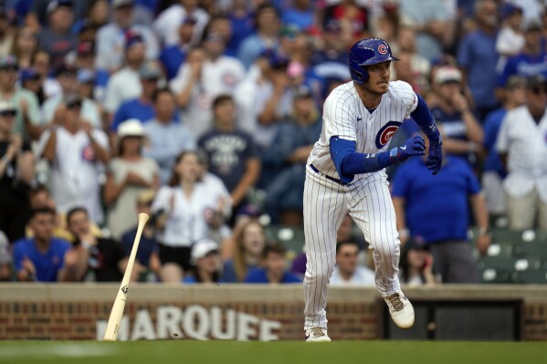 Chicago Cubs' Cody Bellinger drives in two runs with a single in the sixth inning of a baseball game against the St. Louis Cardinals, Saturday, July 22, 2023, in Chicago. (AP Photo/Erin Hooley)