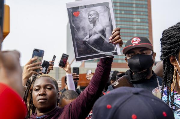 People gather for a "Celebration of Life Memorial" for rapper DMX at Barclays Center, Saturday, April. 24, 2021, in the Brooklyn borough of New York. DMX, whose birth name is Earl Simmons, died April 9 after suffering a "catastrophic cardiac arrest."  (AP Photo/Brittainy Newman)
