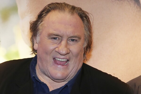 FILE - Actor Gerard Depardieu attends the premiere of the movie "Tour de France" in Paris, France, Monday, Nov. 14, 2016. French actor Gerard Depardieu's behavior came under scrutiny in France after a new documentary showed him repeatedly making obscene remarks and gestures towards women, as new sexual misconduct accusations emerged against him. (AP Photo/Thibault Camus, File)