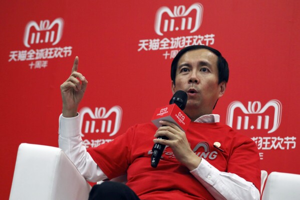 FILE - Daniel Zhang, CEO of Alibaba Group, speaks to journalists during Alibaba's 11.11 Global Shopping Festival, also known as Singles Day, in Shanghai, China, Nov. 11, 2018. The former CEO of Alibaba, Daniel Zhang, resigned as head of its cloud computing unit Monday, Sept. 11, 2023, in a surprise move as the Chinese e-commerce empire wraps up a leadership reshuffle. (AP Photo/Ng Han Guan, File)