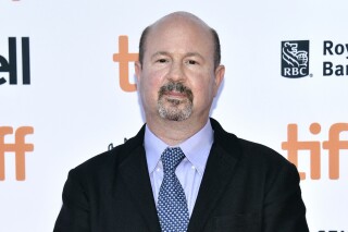 FILE - Michael Mann, then-professor of atmospheric science at Penn State, arrives at the “Before the Flood” premiere on day 2 of the Toronto International Film Festival at the Princess of Wales Theatre on Sept. 9, 2016, in Toronto. A jury on Thursday, Feb. 8, 2024, said Mann was defamed 12 years ago when a pair of conservative writers compared his depictions of global warming to a convicted child molester. (Photo by Evan Agostini/Invision/AP, File)