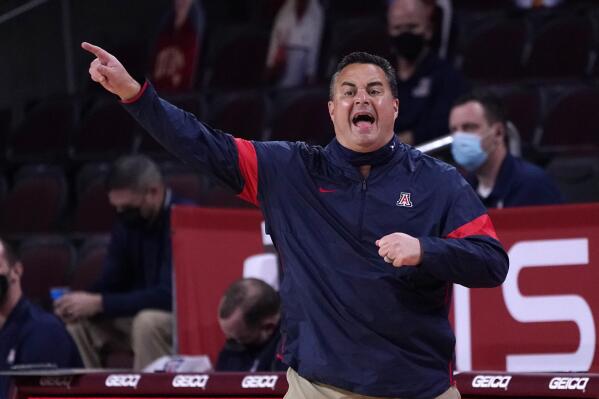 FILE - Arizona head coach Sean Miller instructs from the bench during the first half of an NCAA college basketball game against Southern California on Feb. 20, 2021, in Los Angeles. Miller, former Arizona coach, escaped sanctions on Wednesday, Dec. 14, 2022, when a report from the Independent Accountability Resolution Process largely accepted the program's self-imposed penalties stemming from a NCAA rules violations case that dates back to 2017. (AP Photo/Marcio Jose Sanchez, File)