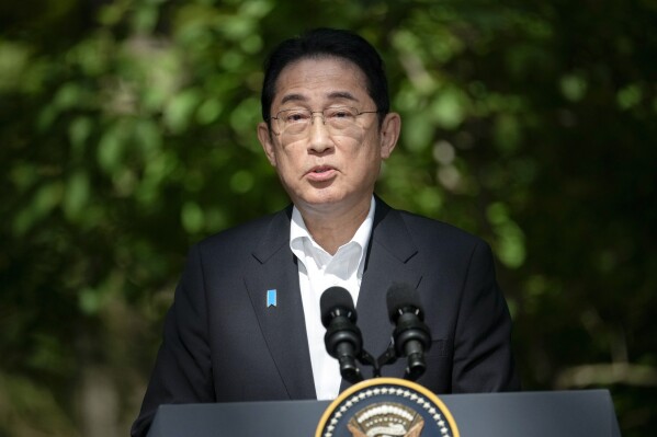 Japan's Prime Minister Fumio Kishida speaks during a joint news conference with President Joe Biden and South Korea's President Yoon Suk Yeol on Friday, Aug. 18, 2023, at Camp David, the presidential retreat, near Thurmont, Md. (AP Photo/Andrew Harnik)