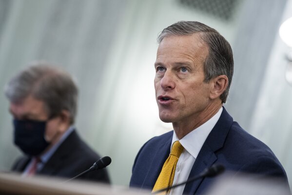 FILE - In this Jan. 26, 2021, file photo, Sen. John Thune, R-S.D., speaks on Capitol Hill in Washington. In an interview with The Associated Press, Sen. Thune, the chamber's No. 2 Republican, likened Trump's insults of Minority Leader Mitch McConnell to "food fights within the family," saying they hurt the Republican party's goals. Thune also talked about his vote to acquit Trump of inciting the attack on the U.S. Capitol that left five people dead. (Tom Williams/Pool Photo via AP File)