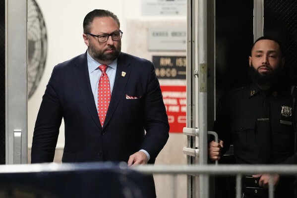 Jason Miller, an advisor to former president Donald Trump, returns to court after a recess, Tuesday, April 16, 2024, in New York. Donald Trump returned to a New York courtroom Tuesday as a judge works to find a panel of jurors who will decide whether the former president is guilty of criminal charges alleging he falsified business records to cover up a sex scandal during the 2016 campaign. (AP Photo/Mary Altaffer, Pool)