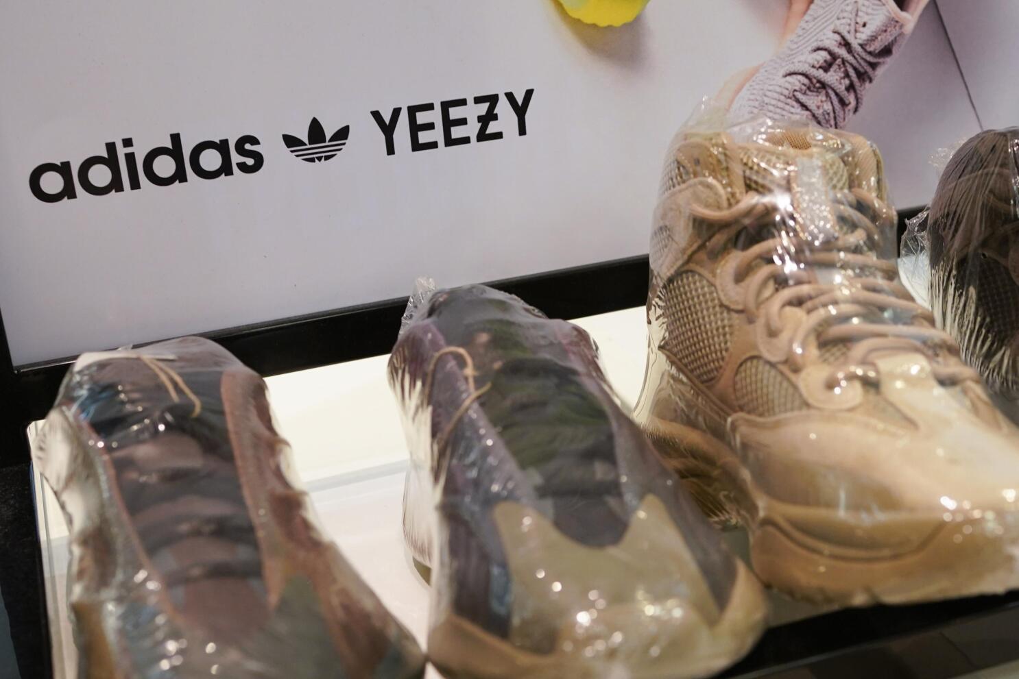 guiden grinende Afspejling Yeezy shoes are back on sale — months after Adidas cut ties with Kanye West  | AP News