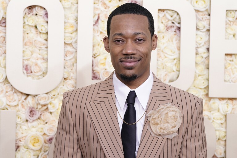 Tyler James Williams arrives at the 81st Golden Globe Awards ceremony held at the Beverly Hilton on Sunday, January 7, 2024 in Beverly Hills, California (Photo by Jordan Strauss/Invision/AP)