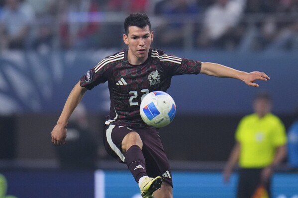 FILE - Mexico forward Hirving Lozano controls the ball during the first half of a CONCACAF Nations League final soccer match against the United States, Sunday, March 24, 2024, in Arlington, Texas. Major League Soccer expansion team San Diego FC has signed winger Hirving “Chucky” Lozano as the club's first Designated Player. Lozano signed a four-year deal through the 2028 season, the team said in its announcement on Thursday, June 6, 2024. (AP Photo/Julio Cortez, File)