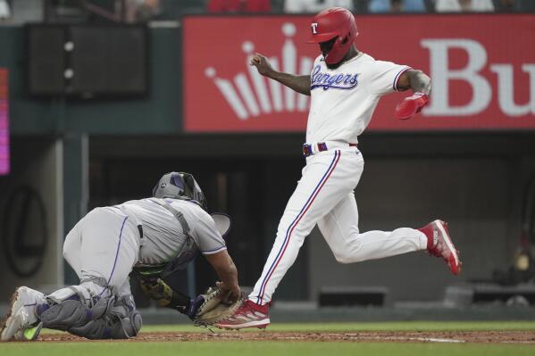 Seager's hitting, Gray's pitching lead Rangers to 11-5 win