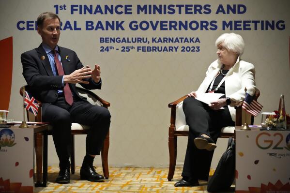 U.S. Treasury Secretary Janet Yellen, right, listens to Britain's Chancellor of the Exchequer Jeremy Hunt during their bilateral meeting on the sidelines of G-20 financial conclave on the outskirts of Bengaluru, India, Friday, Feb. 24, 2023. (AP Photo/Aijaz Rahi)