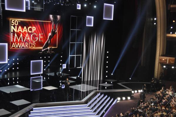 FILE -  Anthony Anderson hosts the 50th annual NAACP Image Awards on March 30, 2019 in Los Angeles. Next year's NAACP Image Awards will be held in-person Feb. 26 in Los Angeles with a live audience. (Photo by Chris Pizzello/Invision/AP, File)