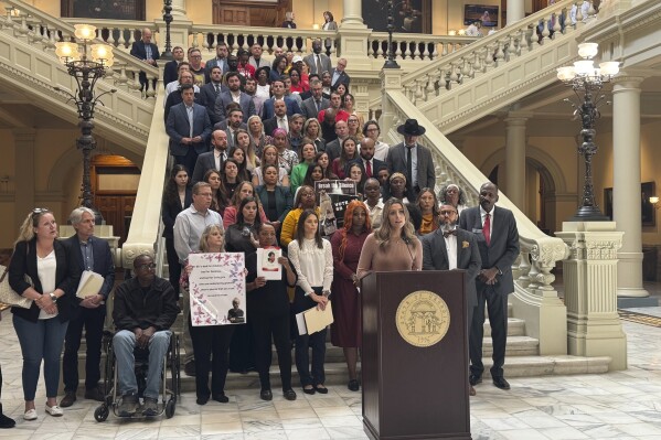 Michal Roseberry, a victim of human trafficking,speaks against Georgia Gov. Brian Kemp's proposal to limit lawsuits on Thursday, March 13, 2025 at the Georgia Capitol in Atlanta, Ga. (AP Photo/Charlotte Kramon)