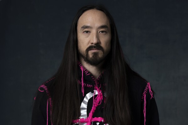 Steve Aoki poses for a portrait on Wednesday, Oct. 25, 2023, in Los Angeles. (Photo by Rebecca Cabage/Invision/AP)