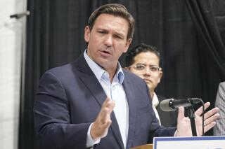Florida Governor Ron DeSantis speaks at the opening of a monoclonal antibody site Wednesday, Aug. 18, 2021, in Pembroke Pines, Fla. The site at C. B. Smith Park will offer monoclonal antibody treatment sold by Regeneron to people who have tested positive for COVID-19.  (AP Photo/Marta Lavandier)