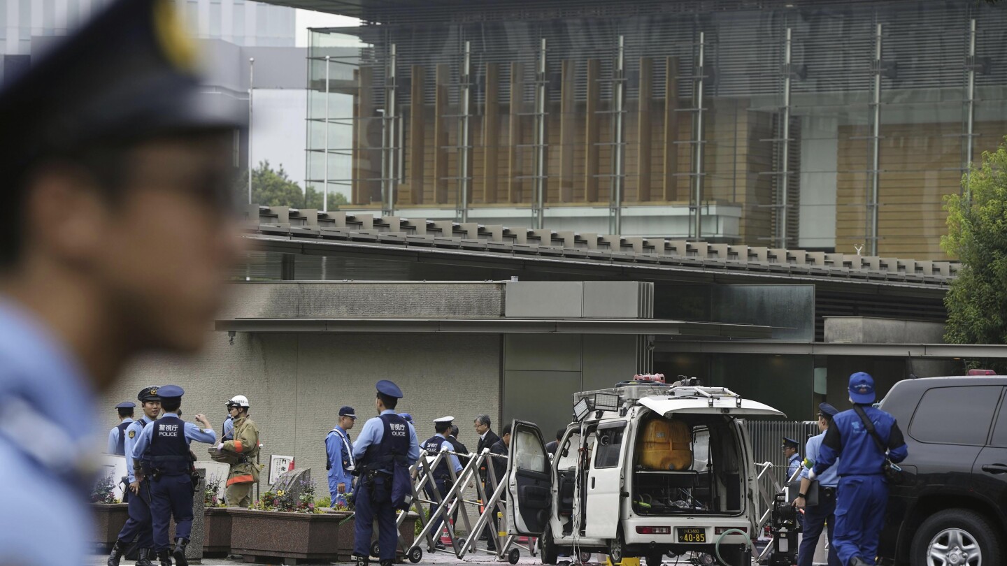 Japan’s ruling party headquarters is attacked with firebombs and suspect is arrested, media report