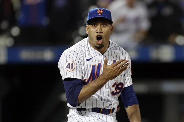 New York Mets pitcher Edwin Diaz reacts after the final out during the ninth inning of a baseball game against the Miami Marlins, Thursday, Sept. 2, 2021, in New York. (AP Photo/Adam Hunger)