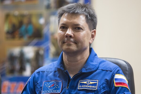 FILE _ Russian cosmonaut Oleg Kononenko, a crew member of the next mission to the International Space Station, attends a news conference at the Russian leased Baikonur Cosmodrome, in Kazakhstan, on July 21, 2015. The 59-year-old Russian cosmonaut has become the first person to spend 1000 days in space, Russian space agency Roscosmos said Wednesday, June 5, 2024. Kononenko achieved the milestone on Tuesday, having made five journeys to the International Space Station dating back to 2008. (AP Photo/Pavel Golovkin, File)