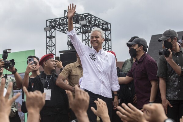 Indonesia's Presidential candidate Ganjar Pranowo, center, waves to his supporters during a campaign rally in Medan, North Sumatra, Indonesia, Monday, Jan. 28, 2024. Indonesians on Wednesday, Feb. 14, 2024 will elect the successor to popular President Joko Widodo, who is serving his second and final term. It is a three-way race for the presidency among current Defense Minister Prabowo Subianto and two former governors, Anies Baswedan and Ganjar Pranowo. (APPhoto/Binsar Bakkara, File)