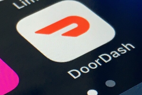 FILE - The DoorDash app is shown on a smartphone on Feb. 27, 2020, in New York. DoorDash reports earnings on Wednesday, Nov. 1, 2023. (AP Photo, File)