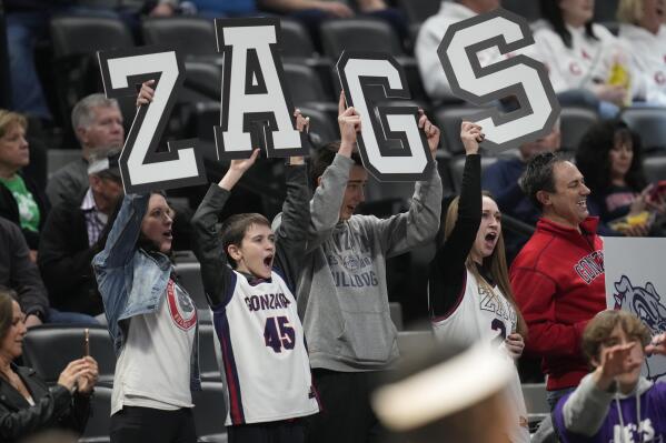 Fans cheer for Gonzaga during the first half of the team's first-round college basketball game in the men's NCAA Tournament against Grand Canyon on Friday, March 17, 2023, in Denver. (AP Photo/David Zalubowski)