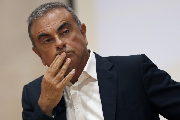 FILE - Former Nissan Motor Co. Chairman Carlos Ghosn holds a press conference at the Maronite Christian Holy Spirit University of Kaslik, in Kaslik, north of Beirut, Lebanon, on Sept. 29, 2020. A Lebanese judge on Monday June 19, 2023, questioned auto tycoon Carlos Ghosn in Beirut over possible links to a former French Cabinet minister who was charged two years ago for dealing with him, officials familiar with the case said. (AP Photo/Hussein Malla, File)