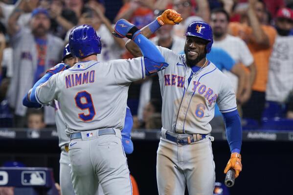 Naquin's two homers, Diaz's two-inning save lift Mets