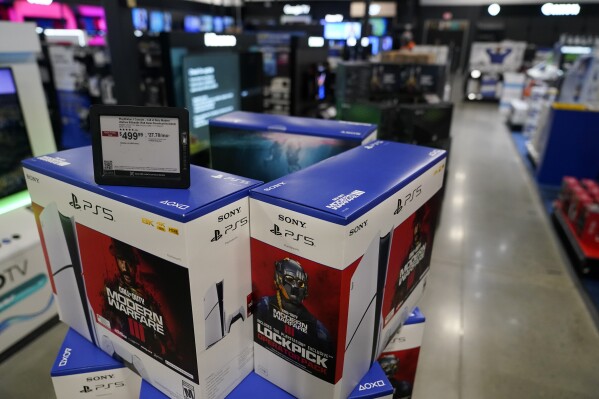 PlayStation 5 consoles are seen at a Best Buy store during Black Friday, Friday, Nov. 24, 2023, in Charlotte, N.C. (AP Photo/Erik Verduzco, File)