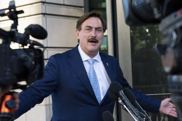 FILE - MyPillow chief executive Mike Lindell speaks to reporters outside federal court in Washington, June 24, 2021. On Wednesday, Feb. 21, 2024, a federal judge affirmed a $5 million arbitration award against the MyPillow chief executive in favor of a software engineer who challenged data that Lindell claims proves that China interfered in the U.S. 2020 elections and tipped the outcome to Joe Biden. (AP Photo/Manuel Balce Ceneta, File)