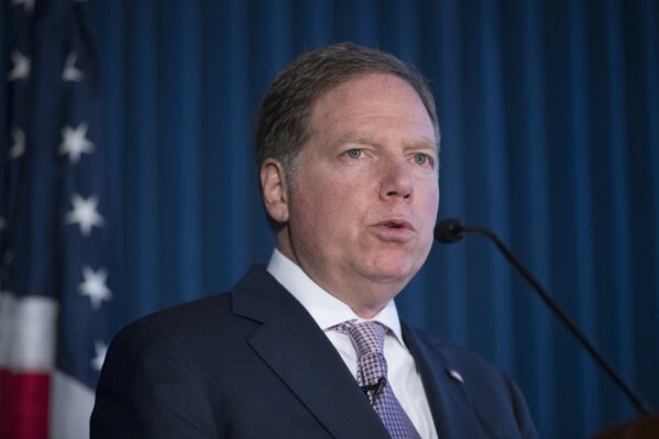 FILE - In this April 23, 2019, file photo, Geoffrey Berman, U.S. Attorney for the Southern District of New York, speaks during a news conference in New York. The Justice Department moved abruptly Friday, June 19, 2020, to oust Berman, the U.S. attorney in Manhattan overseeing key prosecutions of President Donald Trump’s allies and an investigation of his personal lawyer Rudy Giuliani. But Berman said he was refusing to leave his post and his ongoing investigations would continue. (AP Photo/Mary Altaffer, File)