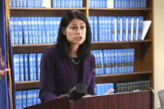 FILE - Attorney General Dana Nessel speaks during a news conference in Detroit, Thursday, Oct. 14, 2021. Faith-based adoption agencies that contract with the state of Michigan can refuse to place children with same-sex couples under a proposed settlement filed in federal court Tuesday, Jan. 25, 2022, months after the U.S. Supreme Court ruled for a Catholic charity in a similar case. (Max Ortiz/Detroit News via AP, File)