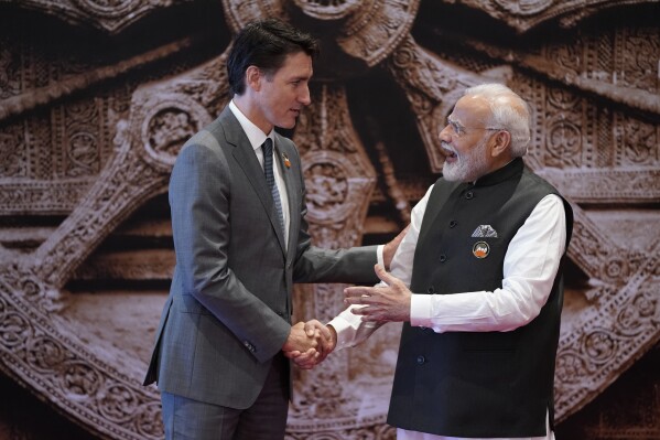 FILE - Indian Prime Minister Narendra Modi welcomes Canada Prime Minister Justin Trudeau upon his arrival at Bharat Mandapam convention center for the G20 Summit, in New Delhi, India, Saturday, Sept. 9, 2023. Canada has expelled a top Indian diplomat on Monday, Sept. 18, 2023, as it investigates what Prime Minister Trudeau called credible allegations that India’s government may have had links to the assassination in Canada of a Sikh activist. (AP Photo/Evan Vucci, File)